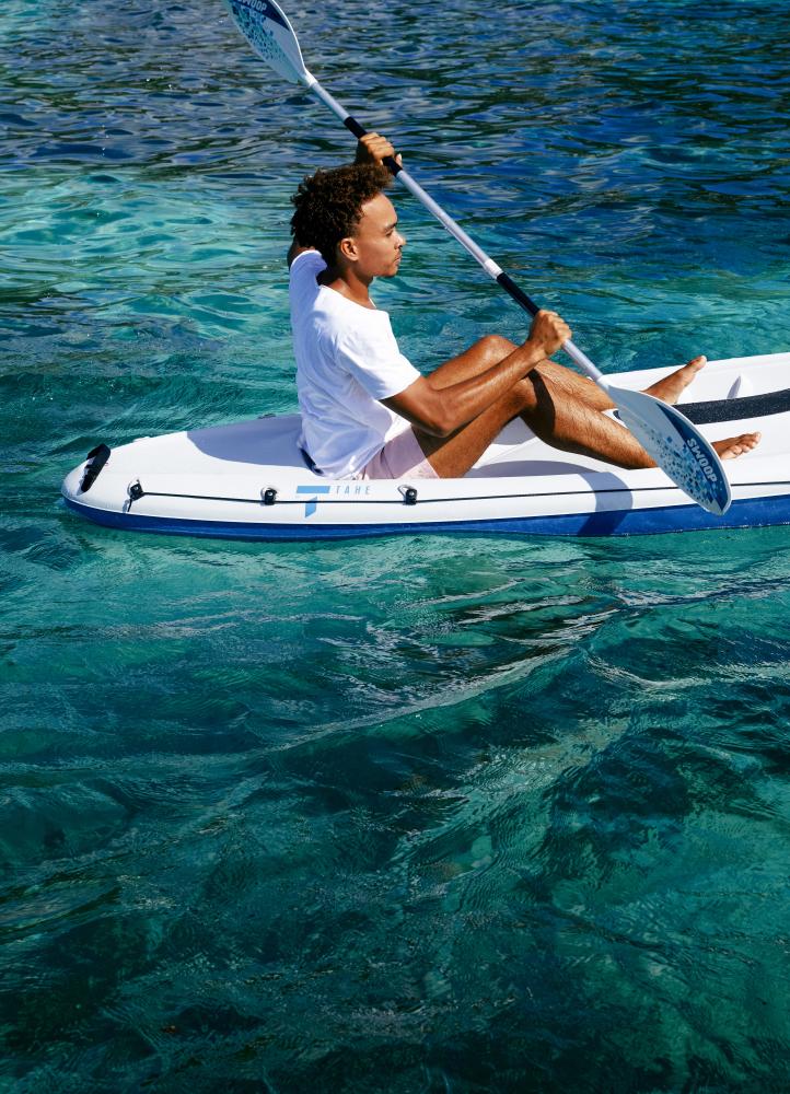 Man kayaking